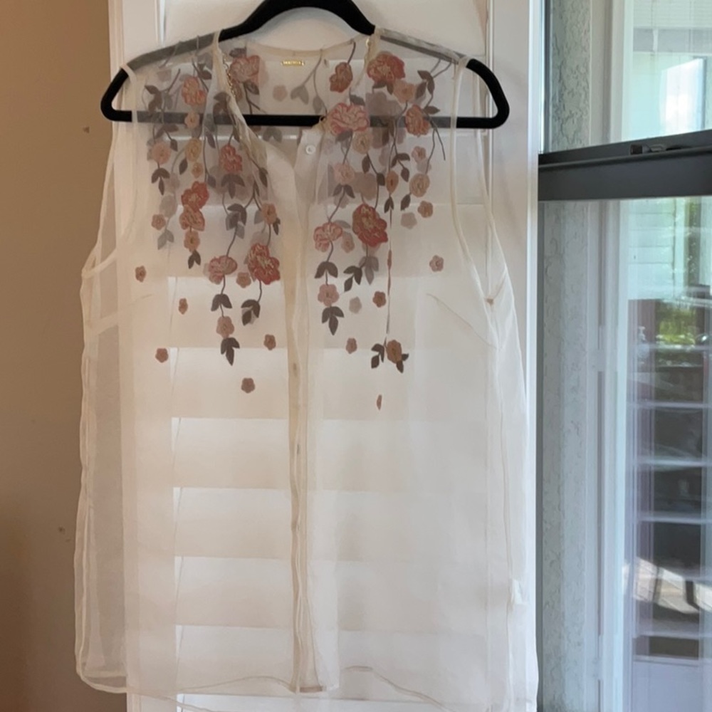 Elie Tahari silk blouse with muted embroidery at the shoulders and neckline.